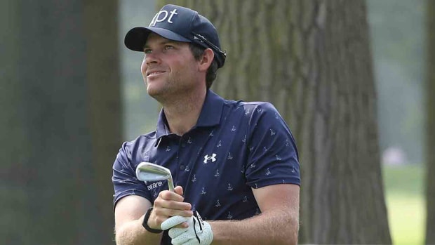 Adam Schenk watches a shot at the 2023 Rocket Mortgage Classic.